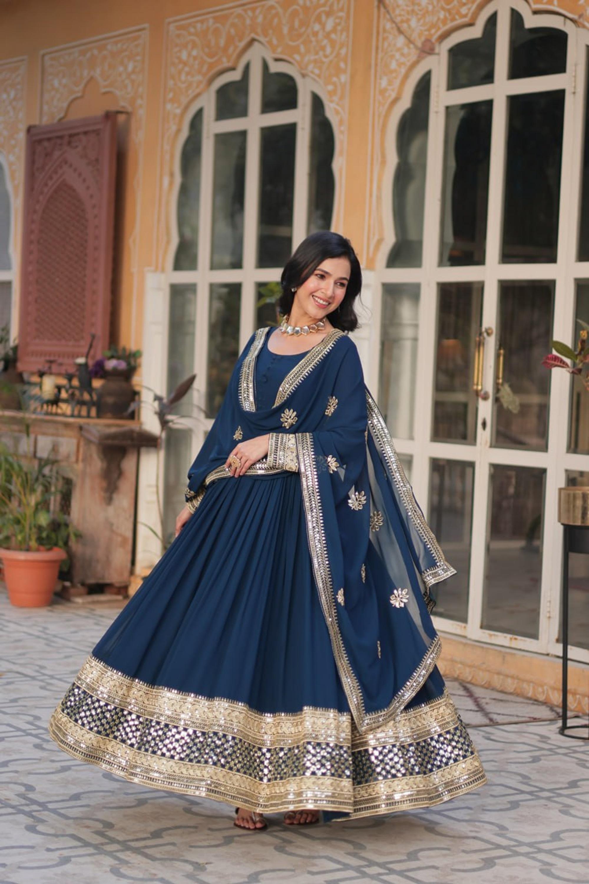 Royal Blue Faux Blooming Gown with Zari Sequins Embroidery Royal Blue Faux Blooming Gown with Zari Sequins Embroidery