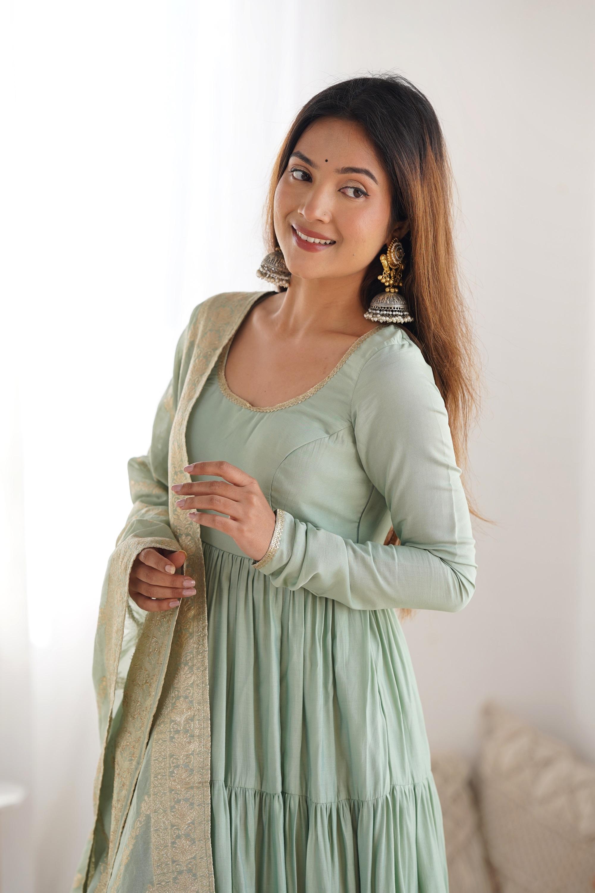 Pistachio Green Roman Silk Four-Layer Anarkali Gown Set Pistachio Green Roman Silk Four-Layer Anarkali Gown Set