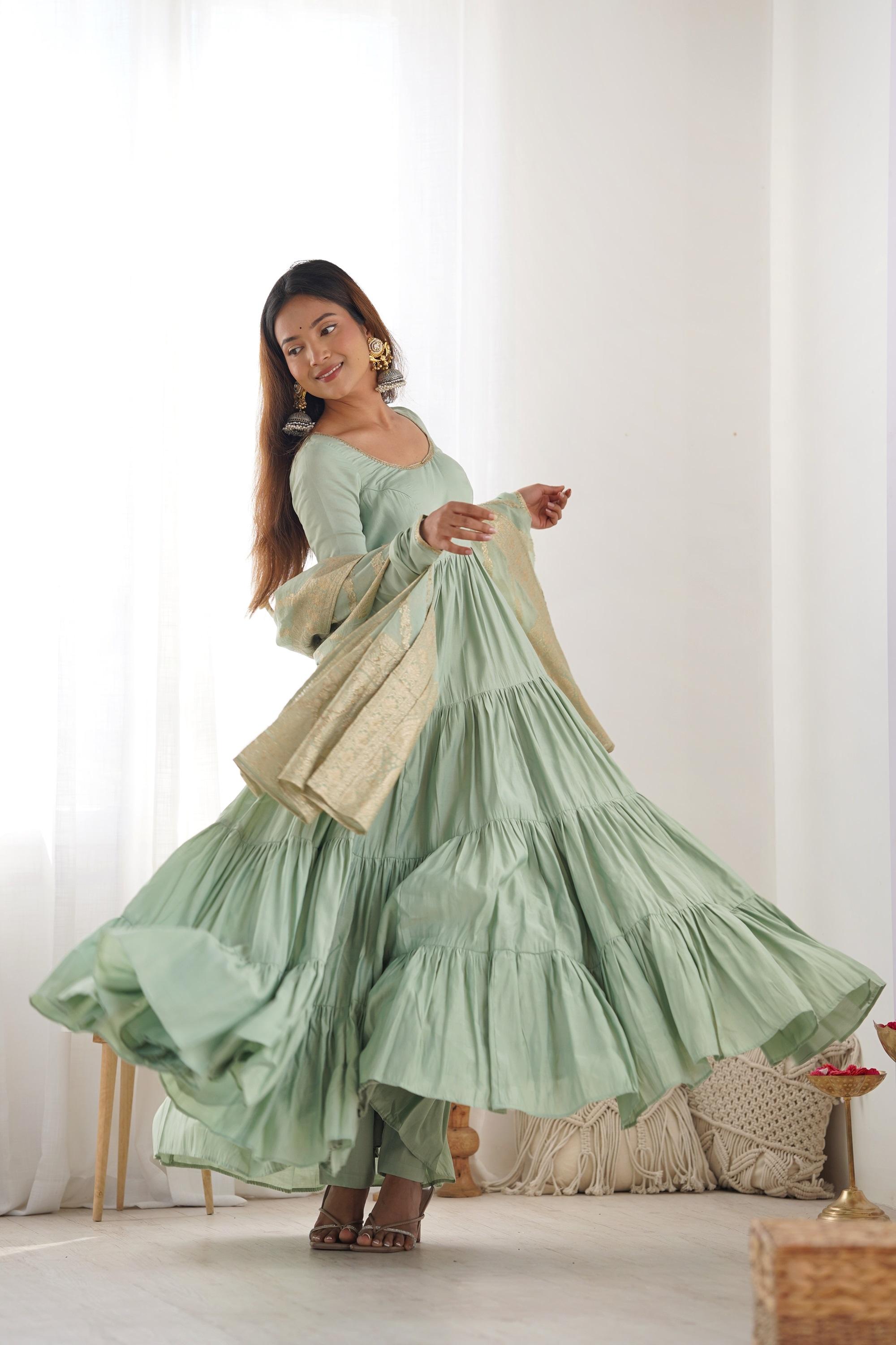 Pistachio Green Roman Silk Four-Layer Anarkali Gown Set Pistachio Green Roman Silk Four-Layer Anarkali Gown Set