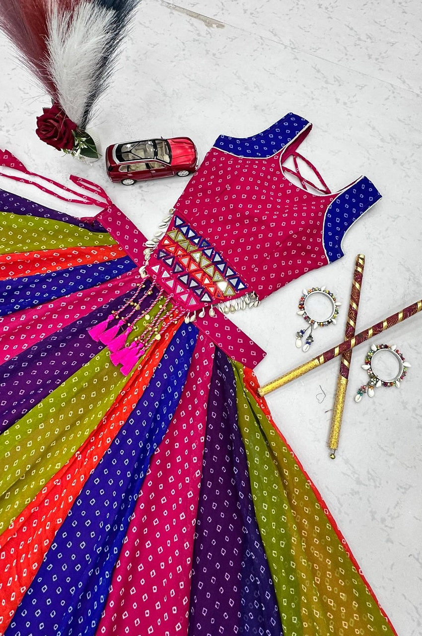 Colorful dress with patterns and accessories on a textured surface