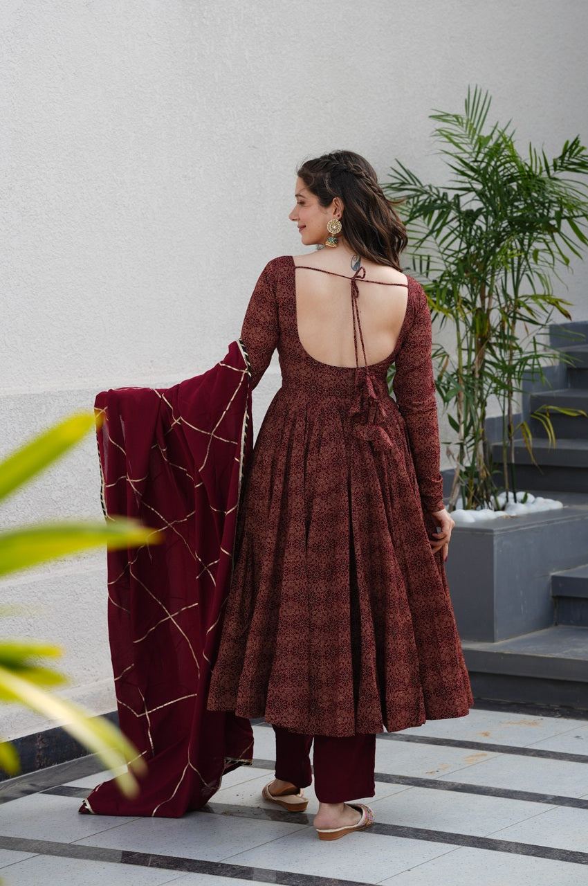 Maroon Pure Cotton Ajrakh Print Anarkali Suit Set With 4.5 Meter Flair, Crape Bottom & Faux Georgette Dupatta L Maroon Pure Cotton Ajrakh Print Anarkali Suit Set With 4.5 Meter Flair, Crape Bottom & Faux Georgette Dupatta L